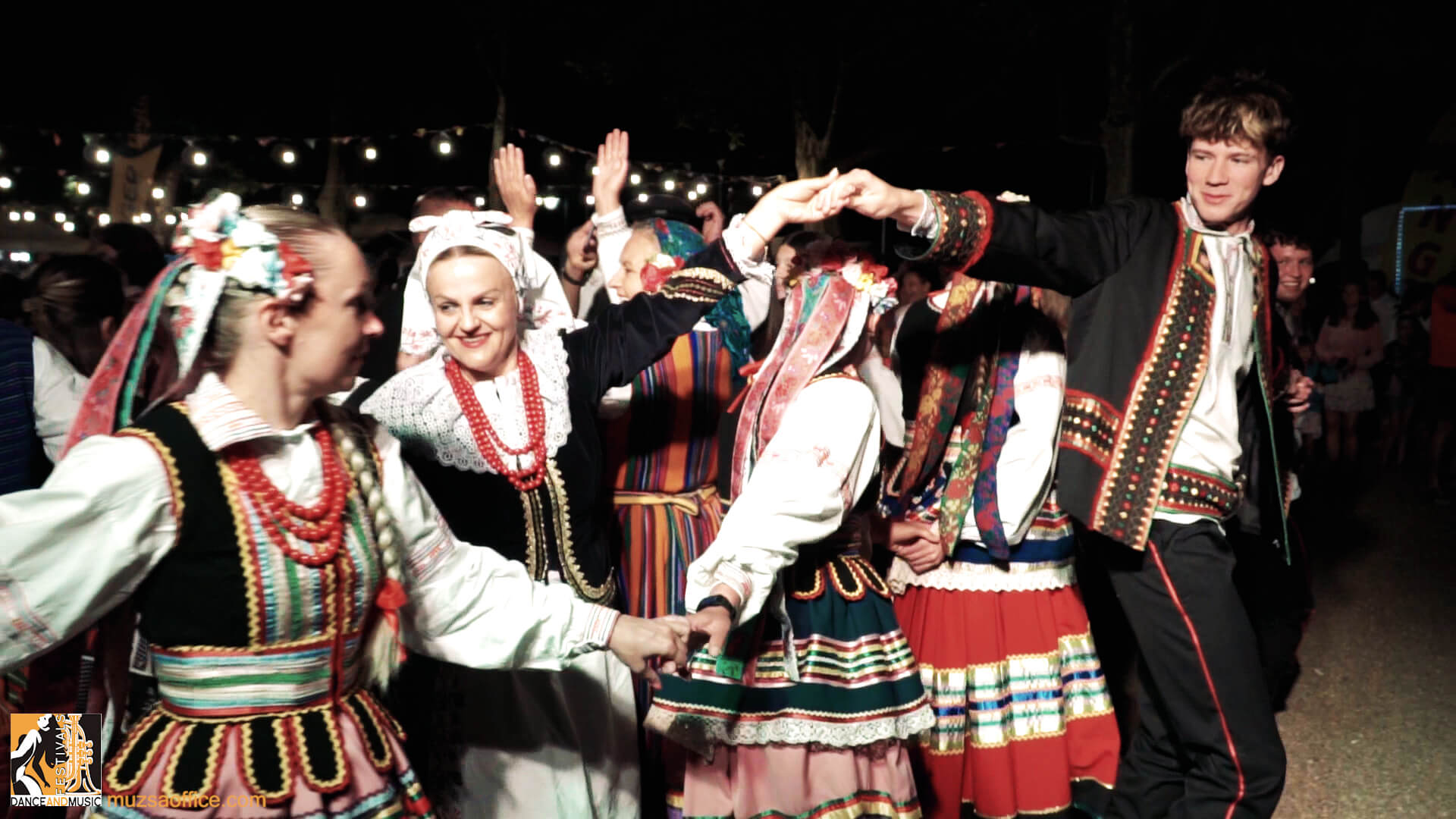 Folklore festival atmosphere with diverse international performing groups.