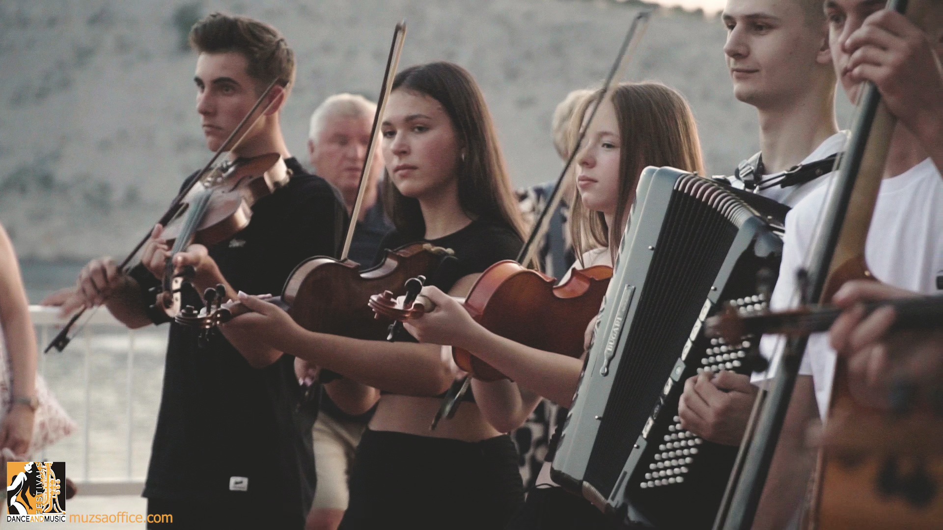 A dynamic performance at an international music and dance festival in Europe, featuring modern dance groups and majorettes.