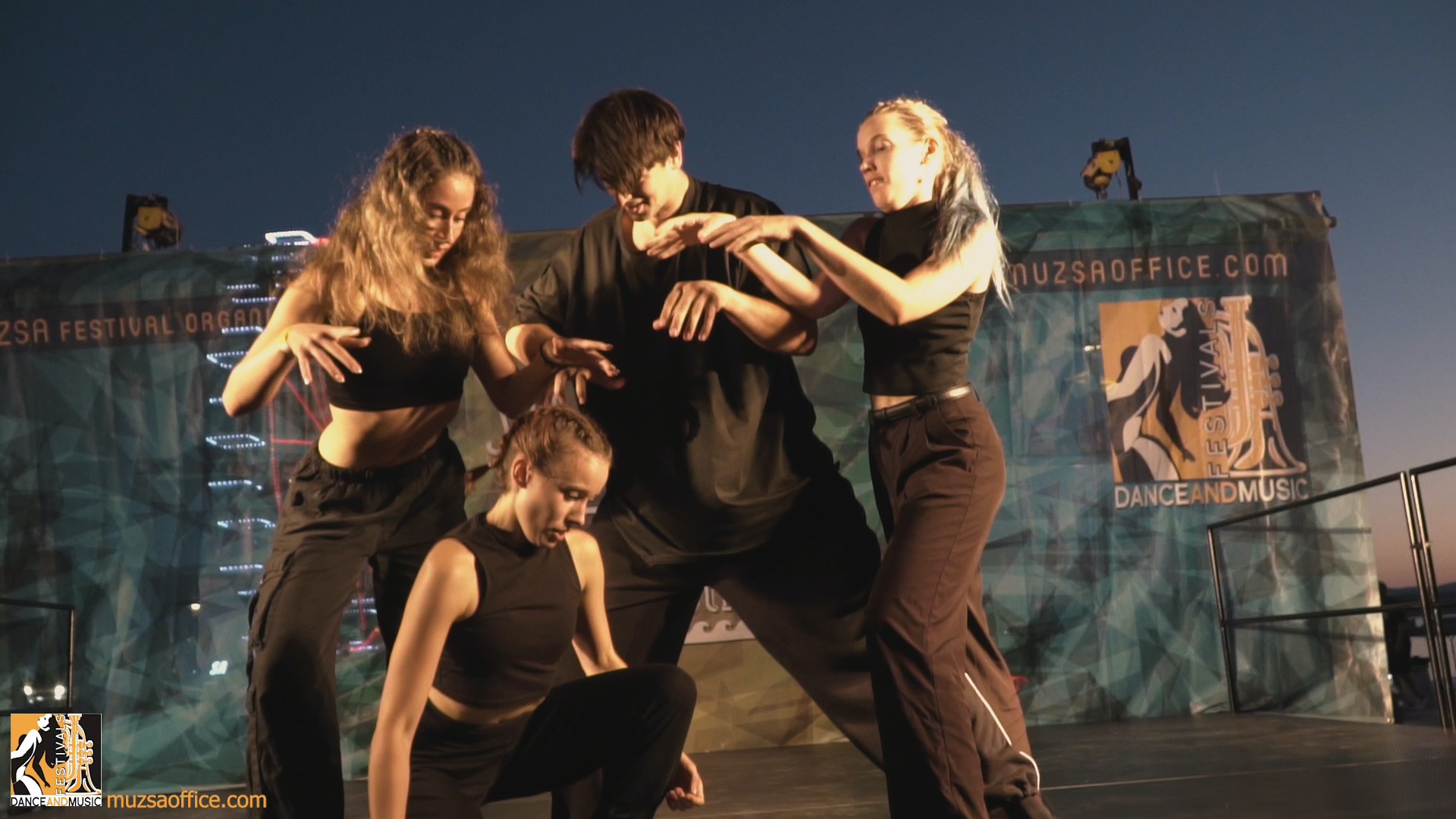A lively festival performance with majorettes and modern dance groups at a European folklore event for international music bands and choirs.